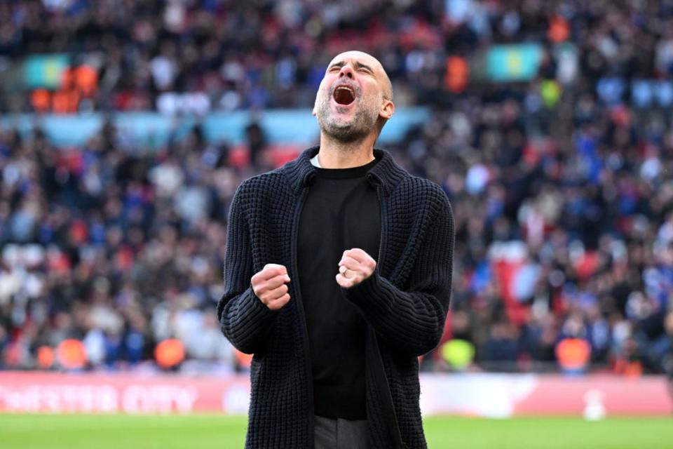 Pep Guardiola celebrates after City reached the FA Cup final (The FA/Getty)