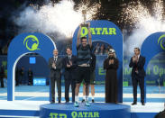 Tennis - ATP - Qatar Open - Khalifa International Tennis and Squash Complex, Doha, Qatar - January 5, 2019 Spain's Roberto Bautista Agut celebrates with the trophy after winning the final against Czech Republic's Tomas Berdych REUTERS/Ibraheem Al Omari