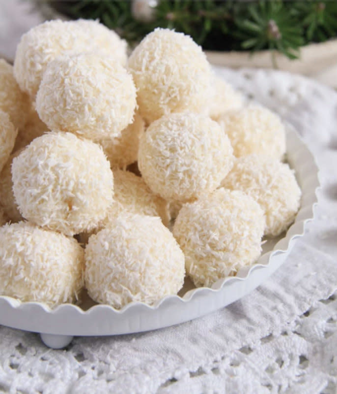 <p>Where Is My Spoon</p><p>Sweet and delicious coconut balls with condensed milk and almonds.</p><p><strong>Get the recipe: <a href="https://whereismyspoon.co/three-ingredient-homemade-raffaello-coconut-almond-balls/" rel="nofollow noopener" target="_blank" data-ylk="slk:3-Ingredient Homemade Raffaello Coconut Balls;elm:context_link;itc:0;sec:content-canvas" class="link ">3-Ingredient Homemade Raffaello Coconut Balls</a></strong></p>