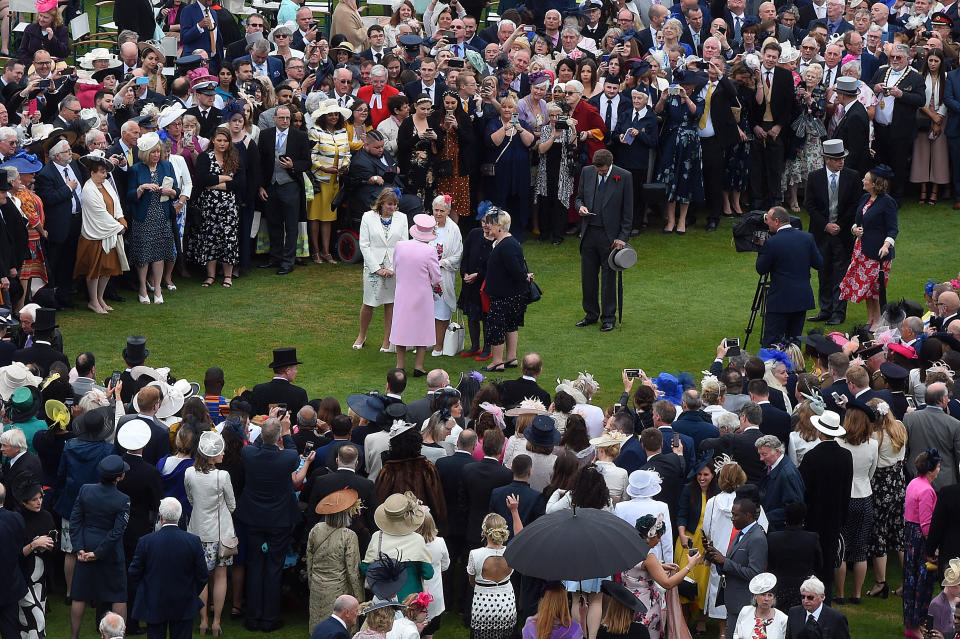 Queen Elizabeth II greets guests during a Royal Garden Party at Buckingham Palace in London.