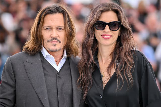 <p>Stephane Cardinale - Corbis/Corbis via Getty</p> Johnny Depp (Left) and Maïwenn in Cannes, France, on May 17, 2023