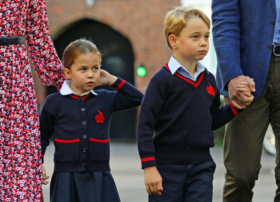 Britain's Princess Charlotte of Cambridge, with her brother, Britain's Prince George of Cambridge, arrives for her first day of school at Thomas's Battersea in London on September 5, 2019. (Photo by Aaron Chown / POOL / AFP)        (Photo credit should read AARON CHOWN/AFP via Getty Images)