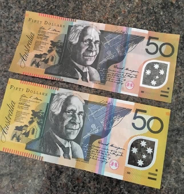 Would you be able to tell which of these notes is a fake? It's the top one.