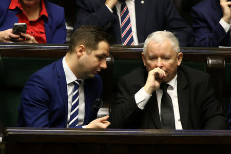 Poland's Deputy Justice Minister Patryk Jaki and Jaroslaw Kaczynski attend a parliamentary sitting in Warsaw, Poland November 24, 2017. Picture taken November 24, 2017. Agencja Gazeta/Slawomir Kaminski via REUTERS