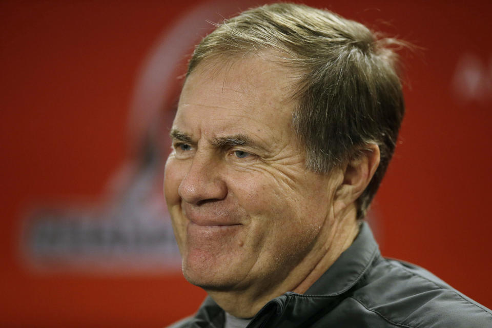 New England Patriots head coach Bill Belichick smiles as he answers a question during a media availability at the NFL football team's facility in Foxborough, Mass., Wednesday, Jan. 15, 2014. The Patriots will play the Denver Broncos in the AFC Championship game Sunday in Denver. (AP Photo/Stephan Savoia)