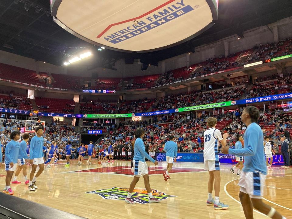 Nicolet players warm up before facing off with Wisconsin Lutheran in the WIAA Division 2 boys basketball state semifinal March 15, 2024 at the Kohl Center in Madison.