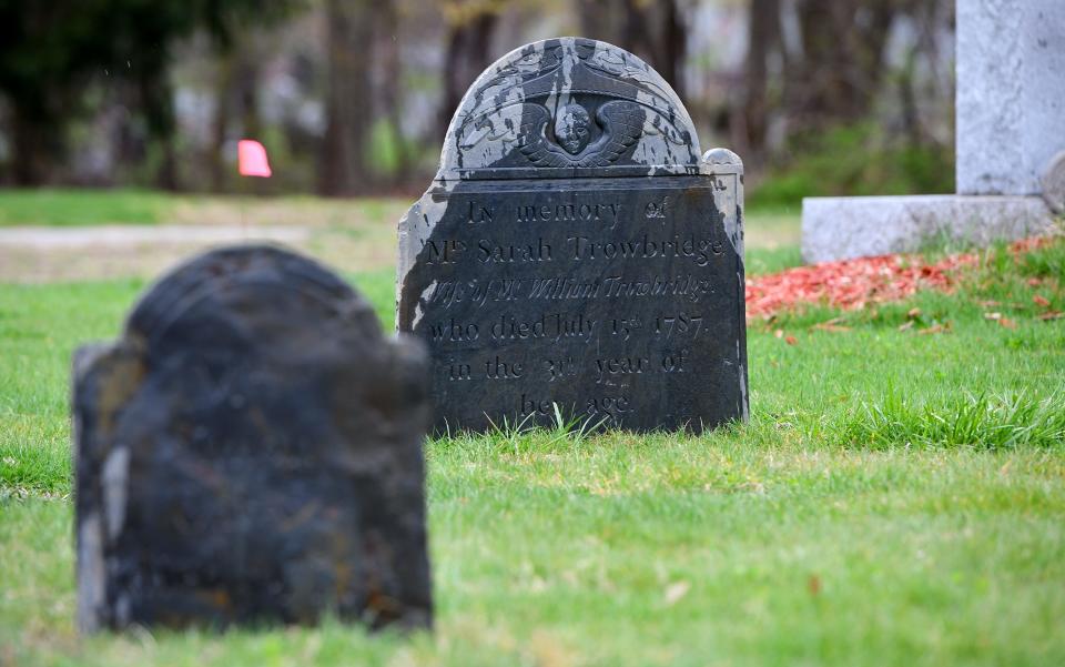 Two gravestones from the 1700s that were unearthed at Hope Cemetery.