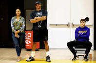Los Angeles Lakers players Russell Westbrook, center, and Austin Reaves, right, look on as new Los Angeles Lakers head coach Darvin Ham (not shown) talks to media at a news conference Monday, June 6, 2022, in El Segundo, Calif. (David Crane/The Orange County Register via AP)