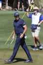 Phil Mickelson grimaces after finishing up on the 9th green during the second round of the 2021 Cologuard Classic golf tournament at the Omni Tucson National Resort on Saturday, Feb. 27, 2021. (Rick Wiley/Arizona Daily Star via AP)