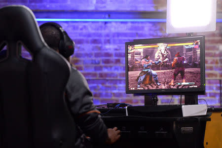 FILE PHOTO: IDK LOC (L) plays during the Tekken 7 top 8 pool play at Esports Arena in Los Angeles, CA, U.S., October 16, 2016. Mandatory Credit: Orlando Ramirez-USA TODAY Sports/File Photo