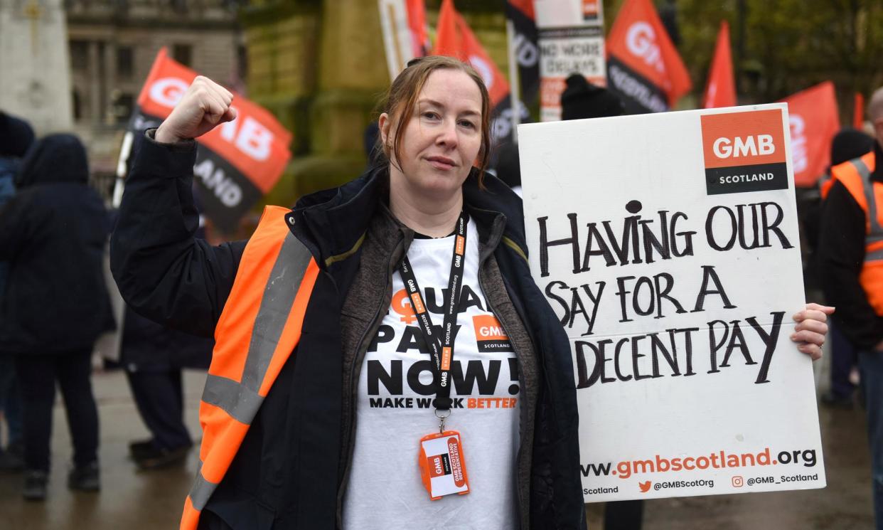 <span>Fiona O’Brien, a home carer in Renfrewshire and a GMB rep, joins striking women workers at a rally for equal pay outside Glasgow City Chambers last week.</span><span>Photograph: James Chapelard</span>