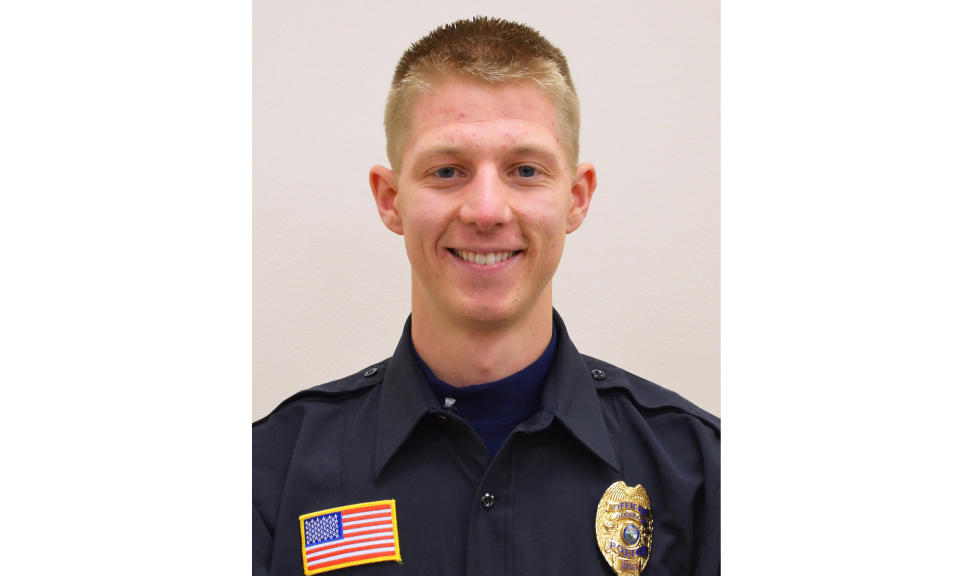 This undated handout photo provided by the Minnesota Bureau of Criminal Apprehension, shows Waseca, Minn. Police Officer Arik Matson. Matson was shot in the head Monday night, Jan. 6, 2020 while responding to a report of a suspicious person in the small southern Minnesota city of in Waseca. Matson, 32, was in critical but stable condition Tuesday. (Minnesota Bureau of Criminal Apprehension via AP)