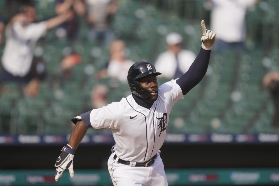 Detroit Tigers' Akil Baddoo reacts after hitting the walk off run during the tenth inning of a baseball game against the Minnesota Twins, Tuesday, April 6, 2021, in Detroit. (AP Photo/Carlos Osorio)