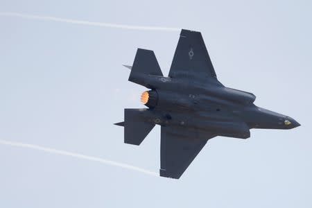 A Lockheed Martin F-35A Lightning II aircraft takes part in a flying display. REUTERS/Pascal Rossignol