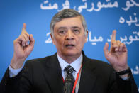 Russian presidential envoy to Afghanistan Zamir Kabulov speaks to media during talks involving Afghan representatives in Moscow, Russia, Wednesday, Oct. 20, 2021. Russia hosted talks on Afghanistan on Wednesday involving senior representatives of the Taliban and neighboring nations, a round of diplomacy that underlines Moscow's clout. Russian Foreign Minister Sergey Lavrov opened the talks and emphasized that "forming a really inclusive government fully reflecting the interests of not only all ethnic groups but all political forces of the country" is necessary to achieve a stable peace in Afghanistan. (AP Photo/Alexander Zemlianichenko, Pool)