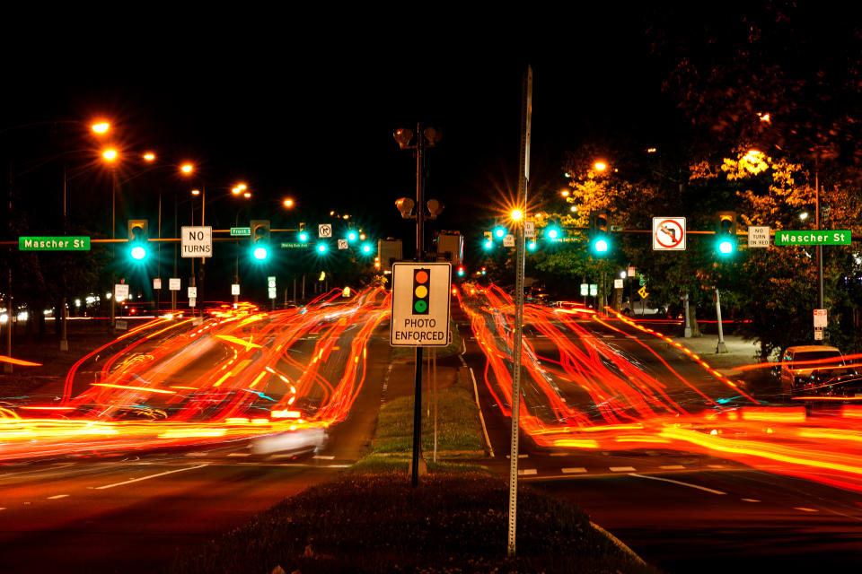 This long exposure photo shows traffic driving on Roosevelt Boulevard in Philadelphia, Wednesday, May 25, 2022. Roosevelt Boulevard is an almost 14-mile maze of chaotic traffic patterns that passes through some of the city's most diverse neighborhoods and Census tracts with the highest poverty rates. Driving can be dangerous with cars traversing between inner and outer lanes, but biking or walking on the boulevard can be even worse with some pedestrian crossings longer than a football field and taking four light cycles to cross. (AP Photo/Matt Rourke)