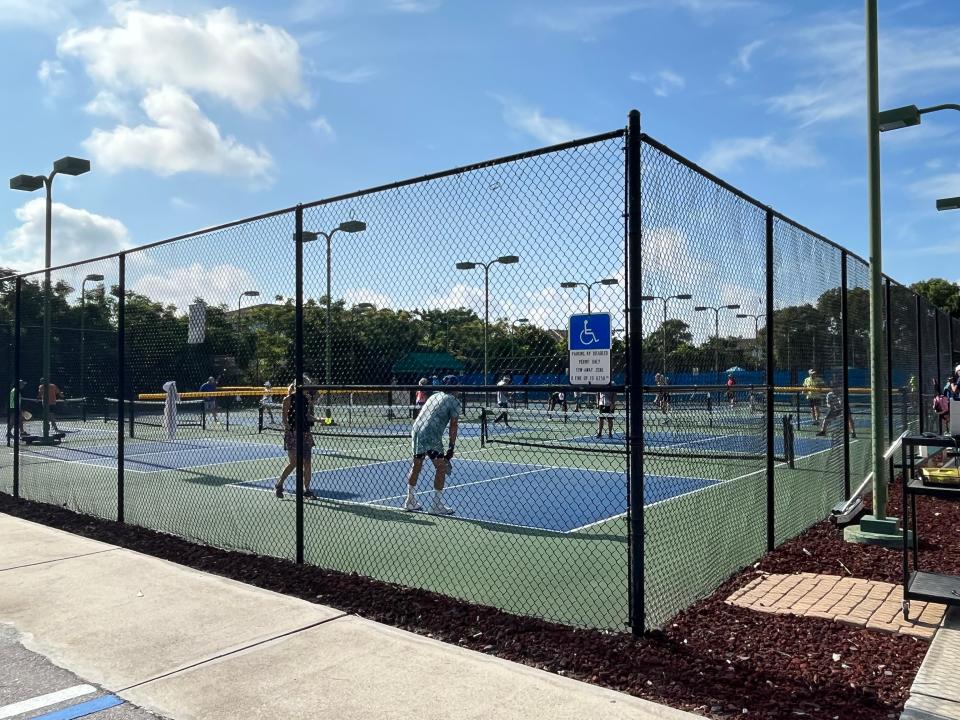 Marco Island Racquet Center on Friday. City officials want to convert the tennis courts to pickleball courts and replace the 38-year-old building.