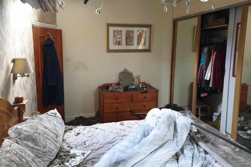 Fallen debris in one of the bedrooms -Credit:Pugh Auctions