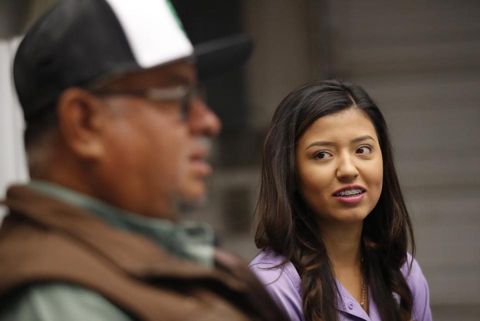 From left, Amaldo Serrato talks about eventually turning over his successful family business to his daughter, Yuleida Serrato. The Serrato family own and run their multigenerational family farm in and around Floydada. Amado Serrato, his wife and father came to the United States, where they and their American born kids have created a successful agricultural business.