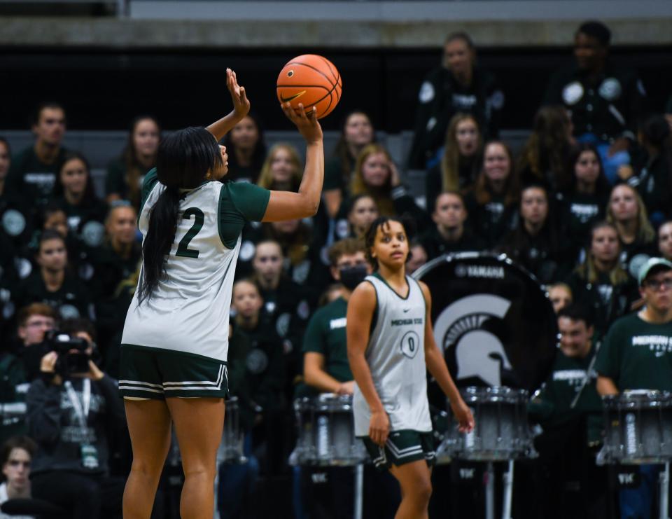 MSU's Olivia Porter sinks a three-pointer during  the Spartans' annual Midnight Madness event Friday, Oct. 7, 2022, at the Breslin Center.