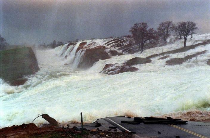 A section of Bonds Flat Road washed away - as designed - when the spillway at Don Pedro Reservoir was opened Jan. 3, 1997. The road was rebuilt after.