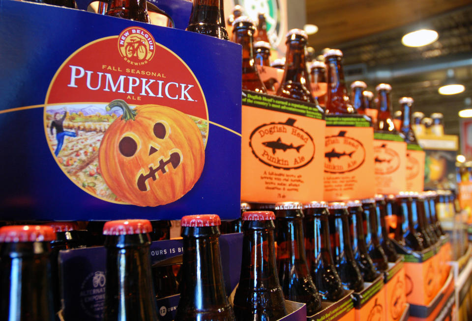 This Friday, Aug. 30, 2013 photo shows pumpkin beers on display for sale at a Whole Foods Market in Richmond, Va. Labor Day may be considered the unofficial end of summer, but some craft brewers couldn’t even wait until then to roll out their pumpkin and other fall seasonal beers. Many already have been in stores and on taps for a month. (AP Photo/Michael Felberbaum)