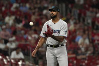 Miami Marlins starting pitcher Sandy Alcantara gets a new ball during the eighth inning of a baseball game against the St. Louis Cardinals Wednesday, June 29, 2022, in St. Louis. (AP Photo/Jeff Roberson)