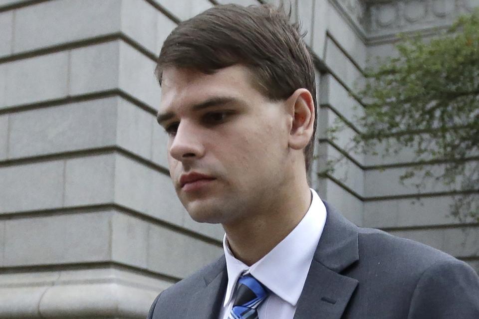 FILE - Nathan Carman leaves federal court in Providence, R.I., Aug. 21, 2019. The man charged with killing his mother at sea during a 2016 fishing trip off the coast of New England in what prosecutors say was a scheme to inherit millions of dollars has died, federal authorities said Thursday, June 15, 2023. (AP Photo/Steven Senne, File)