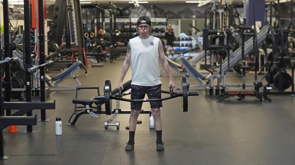 Freestyle skier Jay Riccomini trains at the U.S. Ski & Snowboard Center of Excellence on May 20, 2024, in Park City, Utah. Riccomini competes in the women's events at World Cup events as a transgender male. He's holding off on taking testosterone until his skiing career is finished. (AP Photo/Rick Bowmer)