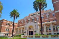 <p>Located in the center of the University of Southern California’s campus, the Doheny Memorial Library is surely in a league of its own amongst other university libraries. Its Italian Romanesque architecture makes for a grand exterior that is complemented by towering palm trees on either side of the entrance, all of which leaves you feeling like you’ve ventured into studying abroad.</p>