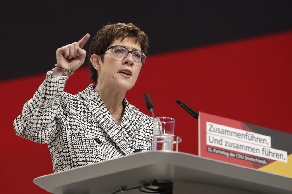 CDU general secretary Annegret Kramp-Karrenbauer delivers her speech when running as chairwoman at the party convention of the Christian Democratic Party CDU in Hamburg, Germany, Friday, Dec. 7, 2018. 1001 delegates are electing a successor of German Chancellor Angela Merkel who doesn't run again for party chairmanship after more than 18 years at the helm of the party. (AP Photo/Michael Sohn)