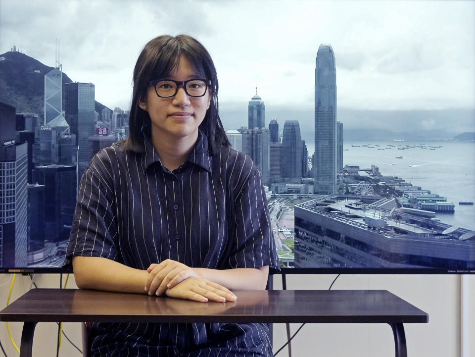 In this Monday, May 24, 2021, photo, Chow Hang Tung, Vice Chairperson of the Hong Kong Alliance in Support of the Democratic Patriotic Movements of China poses after an interview in Hong Kong. Hong Kong police on Friday, June 4, arrested the committee member that organizes the city's annual June 4 museum and candlelight vigil, on the 32nd anniversary of a bloody military crackdown on pro-democracy protesters in Beijing's Tiananmen Square, according to local media reports. (AP Photo/Vincent Yu)