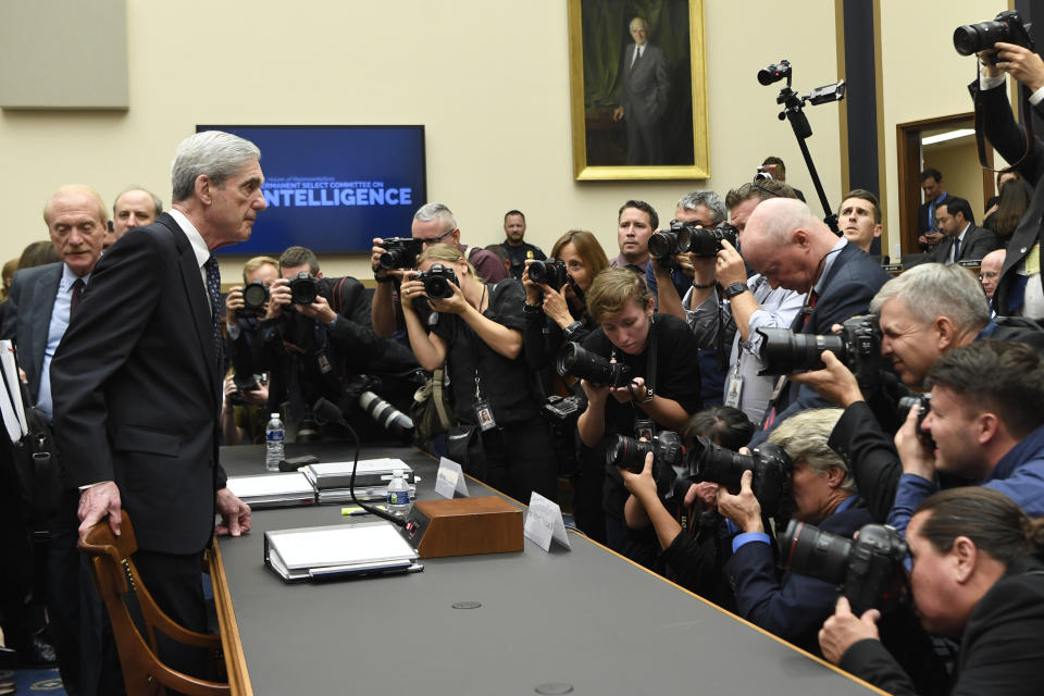 Former special counsel Robert Mueller returns to the witness table following a break in his testimony before the House Intelligence Committee on Capitol Hill in Washington, Wednesday, July 24, 2019. Mueller testified about his report on Russian election interference. (AP Photo/Susan Walsh)