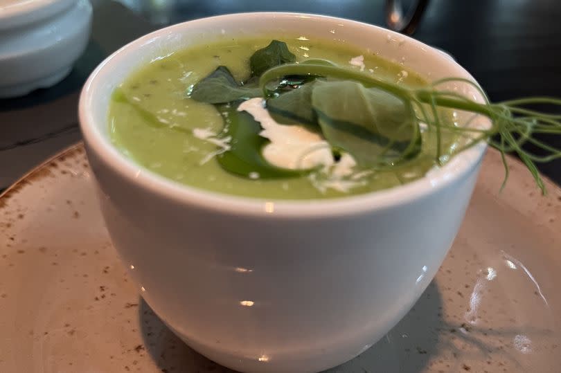 Chilled pea and mint soup with creme fraiche