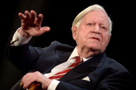 The 95-years old former German Chancellor Helmut Schmidt gestures during his speech at his birthday party, organized by German weekly magazine "Die Zeit", in a theater in Hamburg, January 19, 2014. REUTERS/Fabian Bimmer