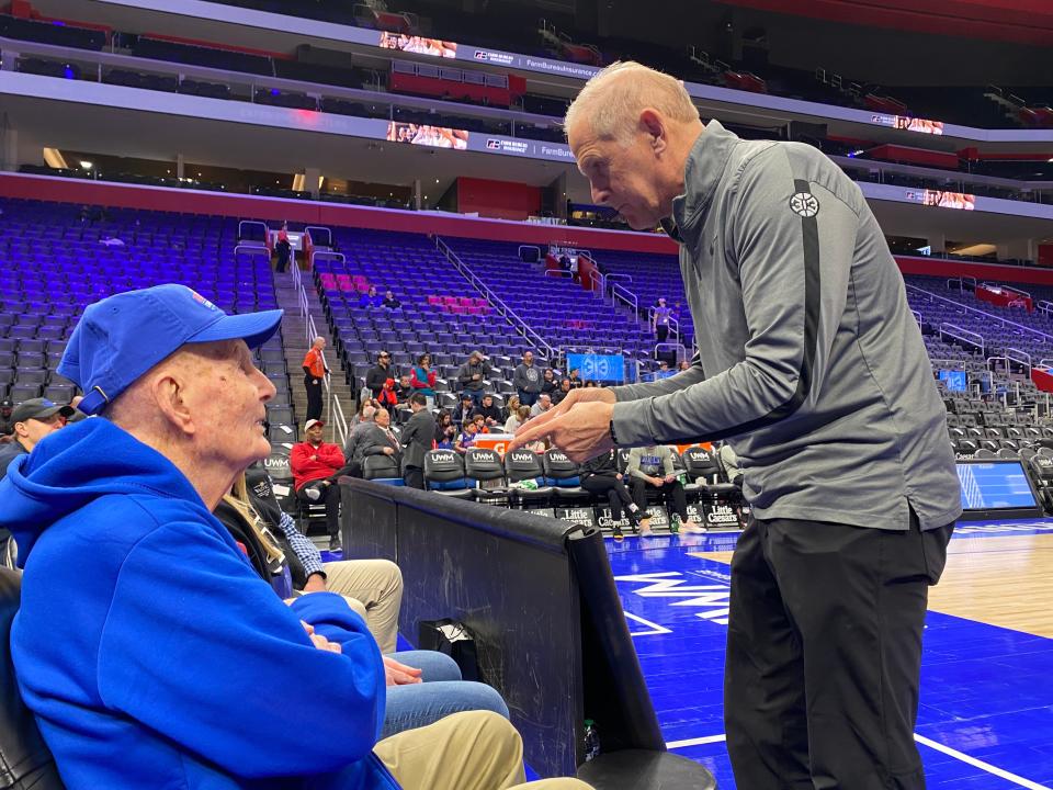 Darryl Raymond, a resident at Waltonwood Cherry Hill assisted living facility in Canton, Michigan, met University of Michigan basketball coach and current Pistons coach, John Beilein, as part of his courtside surprise before a Pistons game on March 13, 2023.