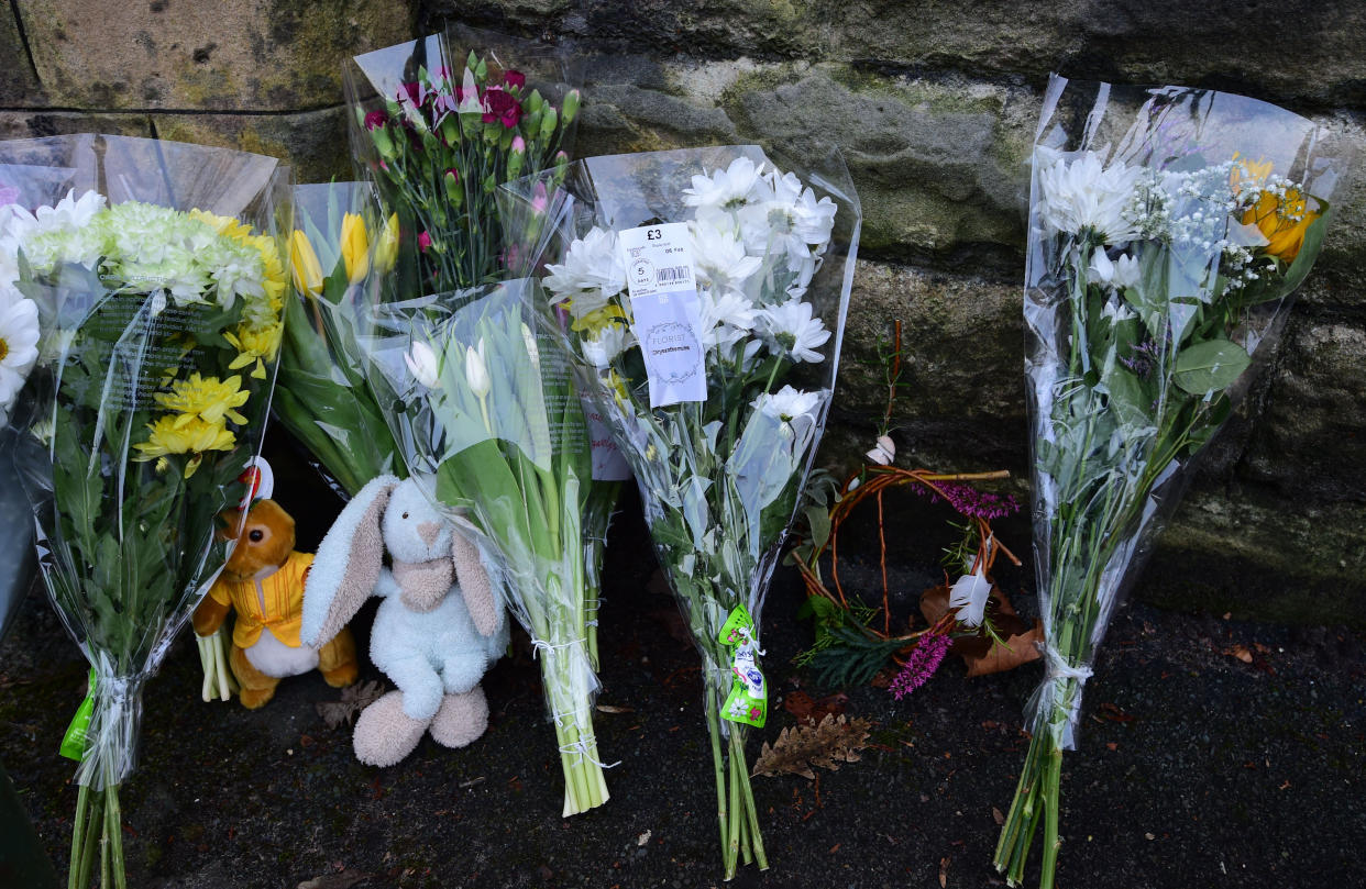 Tributes left at the gates of Brackenwood Park and Golf course, Bebington, Wirral the scene of where a baby boy was found dead.