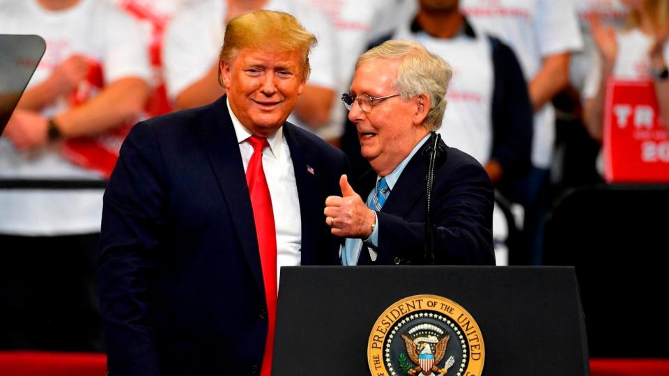 PHOTO: In this Nov. 4, 2019 file photo then President Donald Trump, left, and Senate Majority Leader Mitch McConnell of Ky., greet each other during a campaign rally in Lexington, Ky. (Timothy D. Easley/AP, FILE)