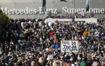 Fans line up outside Mercedes-Benz Superdome before the NFL football NFC championship game between the New Orleans Saints and the Los Angeles Rams Sunday, Jan. 20, 2019, in New Orleans. (AP Photo/Gerald Herbert)