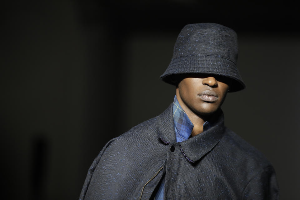 A model wears a creation as part of the Jieda 20/21 collection, that was presented in Milan, Italy, Tuesday, Jan. 14, 2020. (AP Photo/Luca Bruno)