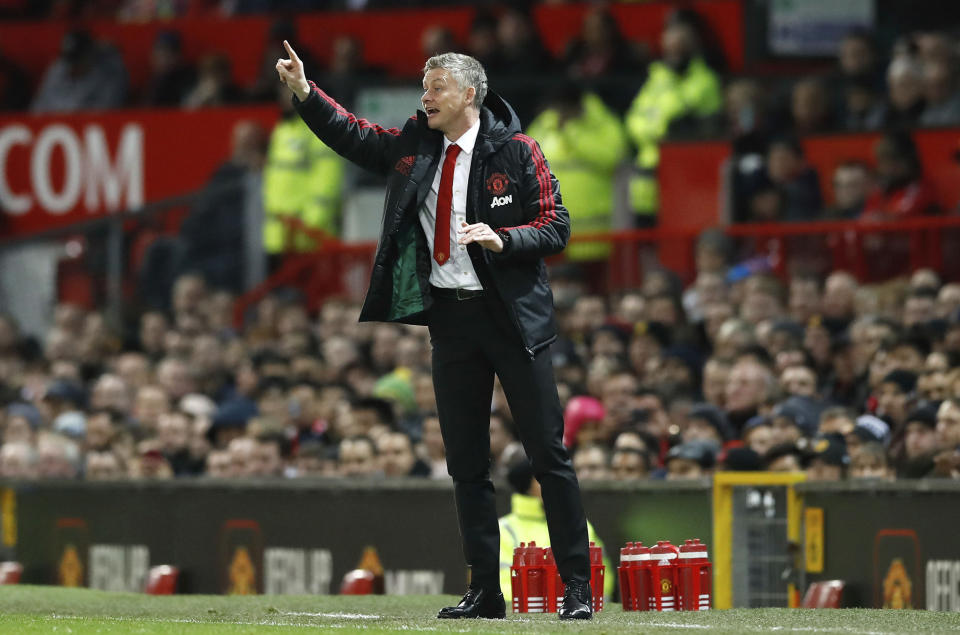 Manchester United interim manager Ole Gunnar Solskjaer gestures on the touchline during the match against Bournemouth, during their English Premier League soccer match at Old Trafford in Manchester, England, Sunday Dec. 30, 2018. (Martin Rickett/PA via AP)