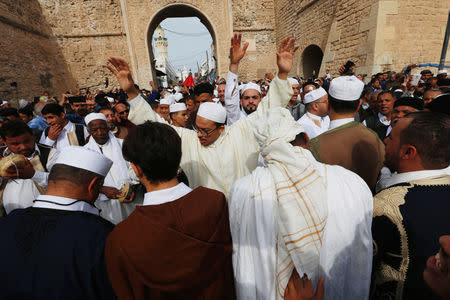 Libyan Sufi Muslims chant and beat drums during a procession to commemorate Prophet Mohammad's birthday, also known as Mawlid, in the old city of the Libyan capital Tripoli, Libya November 20, 2018. REUTERS/Ismail Zitouny