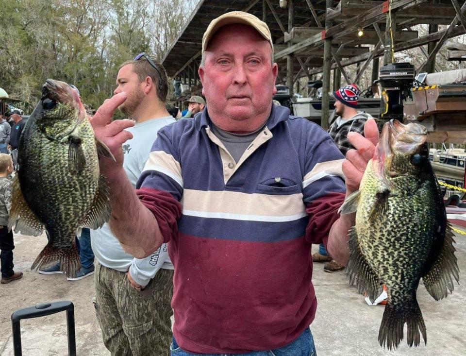 Terry Barker with a pair of the specks that helped him win last weekend's Berkeley LaBaw Memorial Speck Fishing Tournament in DeLand.