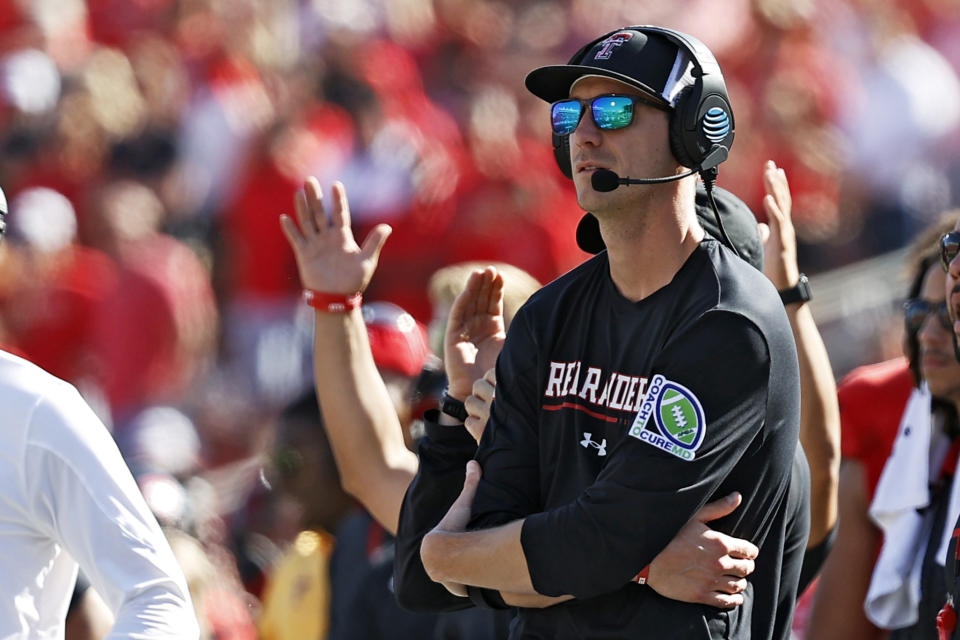 FILE - Texas Tech offensive coordinator Zach Kittley watches from the sidelines during the second half of an NCAA college football game against Texas, on Saturday, Sept. 24, 2022, in Lubbock, Texas. Kittley is the son of the longtime Texas Tech track coach and NCAA championship winner Wes Kittley. The younger Kittley was always consumed by football growing up. (AP Photo/Brad Tollefson, File)