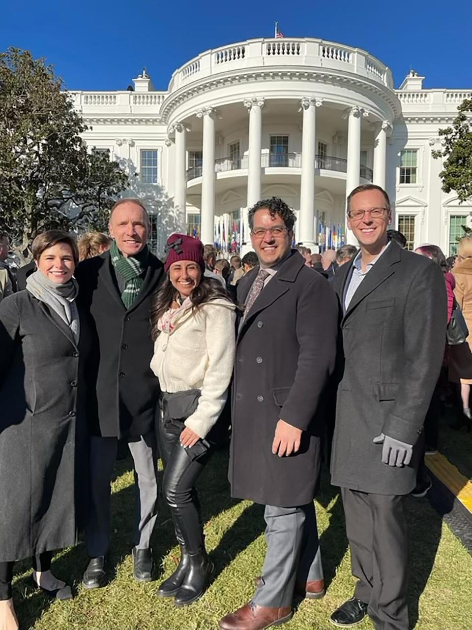 On the south lawn of the White House, these former and current elected officials from Michigan celebrate the Respect for Marriage Act after watching President Joe Biden sign the law on Tuesday, Dec. 13, 2022. From left are State Rep. Laurie Pohutsky, D-Livonia; Oakland County Executive Dave Coulter; State Rep. Mari Manoogian, D-Birmingham; Jason Franklin, a political consultant; and State Rep. Jon Hoadley, D-Kalamazoo.