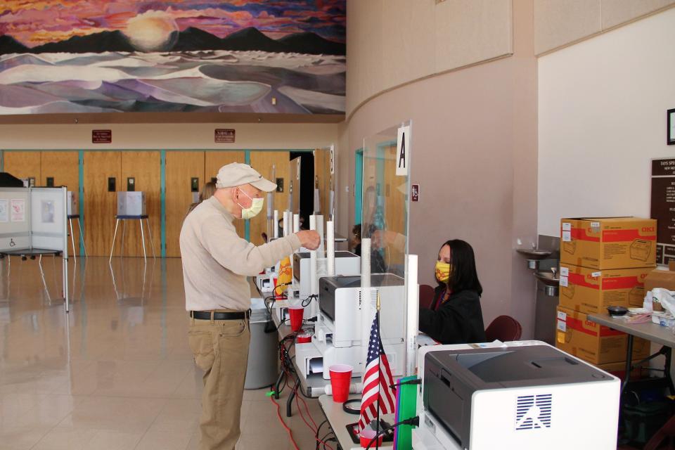 A voter gets checked in by a poll worker at the Tays Center in Alamogordo on November 2, 2021. 

Voter Convenience Centers in Otero County opened at 7 a.m. on November 2, 2021 for Election Day voting in the 2021 local elections.