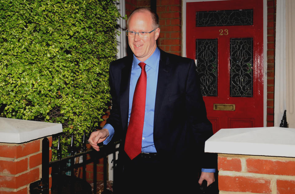 BBC Director-General George Entwhistle leaves his home in south west London Tuesday Oct. 23, 2012. The director general of the BBC is set to face a lawmaker committee to explain why the broadcaster pulled an expose unmasking one of its most popular entertainers as a pedophile. George Entwistle will face lawmakers on the Culture Media and Sport Select Committee on Tuesday. The appearance comes a day after BBC reporters put their own bosses in the hot seat over their role in the expanding pedophilia scandal. (AP Photo/Stefan Rousseau/PA Wire) UNITED KINGDOM OUT