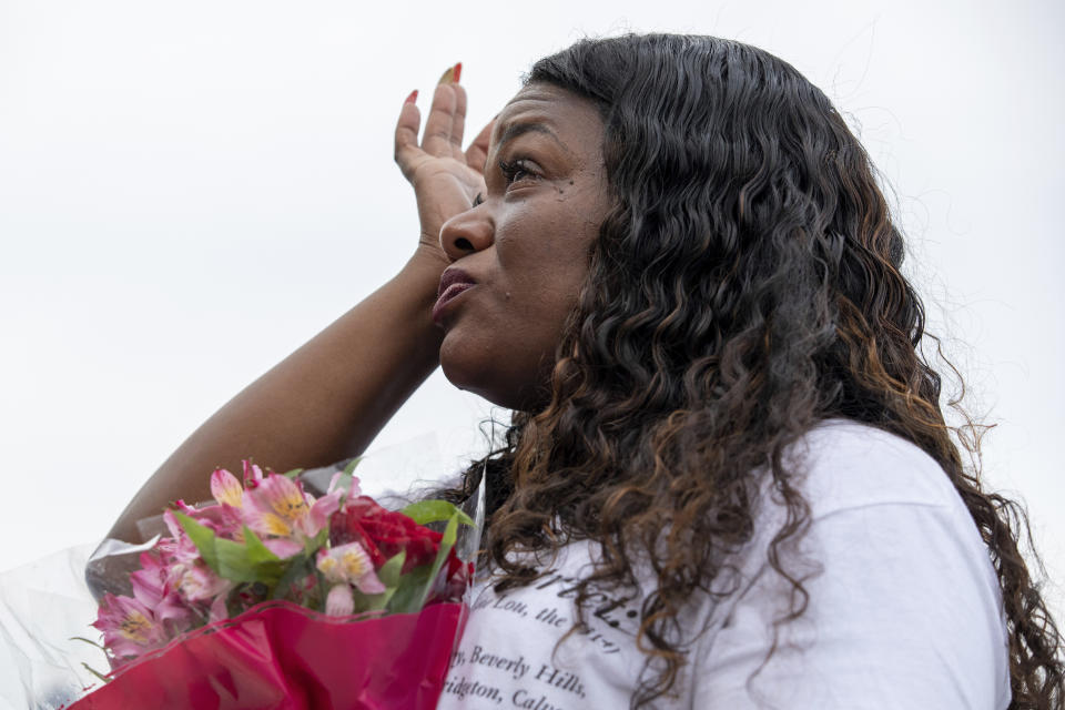 Rep. Cori Bush, D-Mo., cries after it was announced that the Biden administration will enact a targeted nationwide eviction moratorium outside of Capitol Hill in Washington on Tuesday, August 3, 2021. For the past five days, lawmakers and activists primarily led by Rep. Cori Bush, D-Mo., have been sitting in on the steps of Capitol Hill to protest the expiration of the eviction moratorium. Bush herself was homeless before running for office. (AP Photo/Amanda Andrade-Rhoades)