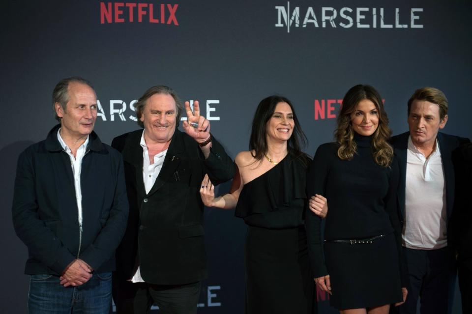 (From L) French actors Hippolyte Girardot, Gerard Depardieu, Geraldine Pailhas,  Nadia Fares and Benoit Magimel pose during a photocall for the premiere of the French TV show 