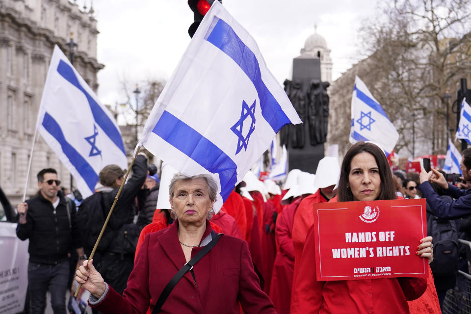 Protestors demonstrate during a visit of Israeli Prime Minister Benjamin Netanyahu to London, Friday, March 24, 2023.(AP Photo/Alberto Pezzali)